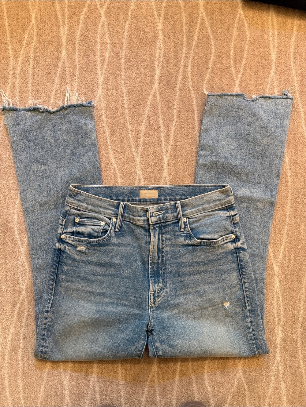 MOTHER jeans size 27 Light Wash Distressed Raw Hem Denim.